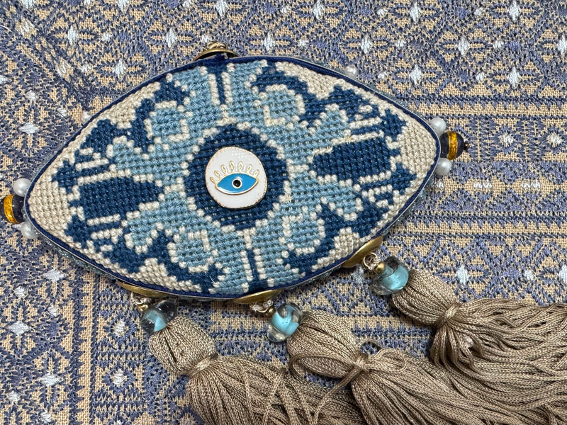 Light beige , royal blue and light blue charm.🧿
